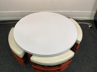 MID CENTURY ORANGE RATTAN STOOLS AND LAMINATE COFFEE TABLE