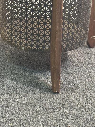 MID CENTURY PERFORATED METAL AND WOOD THREE LEGGED TRASH CANNISTER