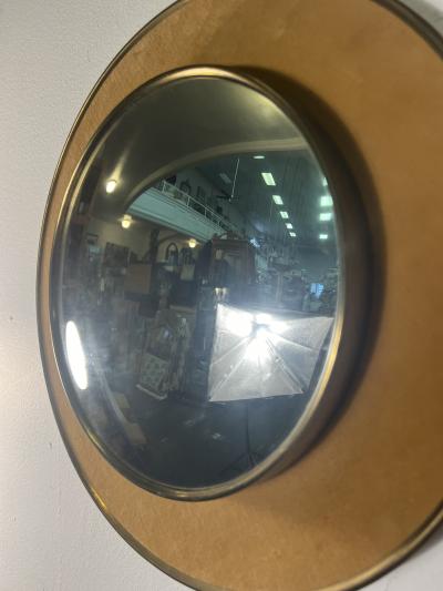MID CENTURY ROUND VELVET AND BRASS CONVEX MIRROR WITH BRASS RING