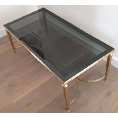 MID CENTURY SOLID BRASS COFFEE TABLE WITH SMOKE GLASS CURVED STRETCHER