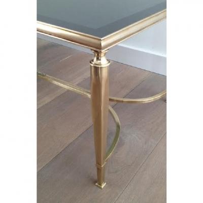 MID CENTURY SOLID BRASS COFFEE TABLE WITH SMOKE GLASS CURVED STRETCHER