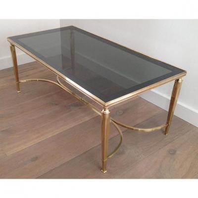 MID CENTURY SOLID BRASS COFFEE TABLE WITH SMOKE GLASS CURVED STRETCHER