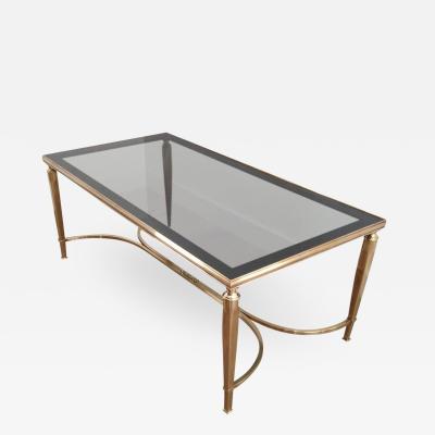 MID CENTURY SOLID BRASS COFFEE TABLE WITH SMOKE GLASS CURVED STRETCHER