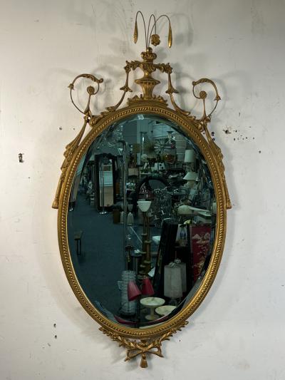 MODERN ANTIQUE REPRODUCTION OF GILT WOOD AND GESSO FEDERAL OVAL MIRROR