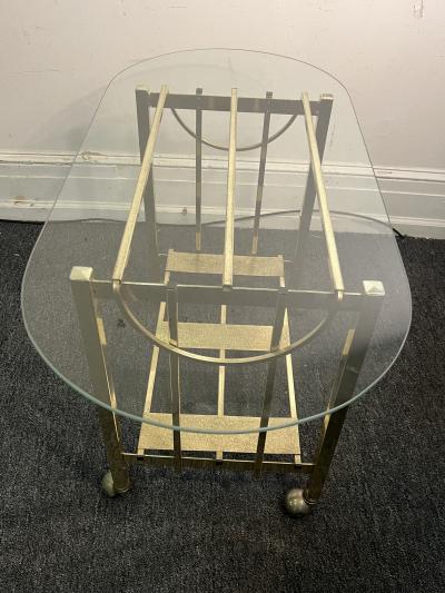 MODERN GOLDTONE TUBULAR METAL WITH GLASS OBLONG TOP BAR CART