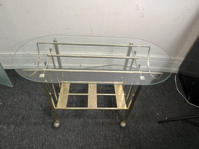 MODERN GOLDTONE TUBULAR METAL WITH GLASS OBLONG TOP BAR CART