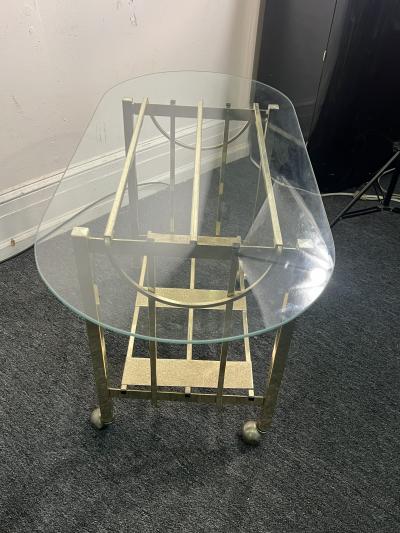 MODERN GOLDTONE TUBULAR METAL WITH GLASS OBLONG TOP BAR CART