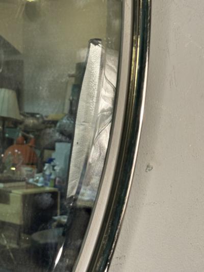 MODERN PAIR OF FLOATING OVAL CHROME FRAMED MIRRORS