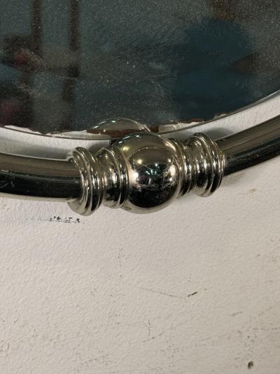 MODERN PAIR OF FLOATING OVAL CHROME FRAMED MIRRORS