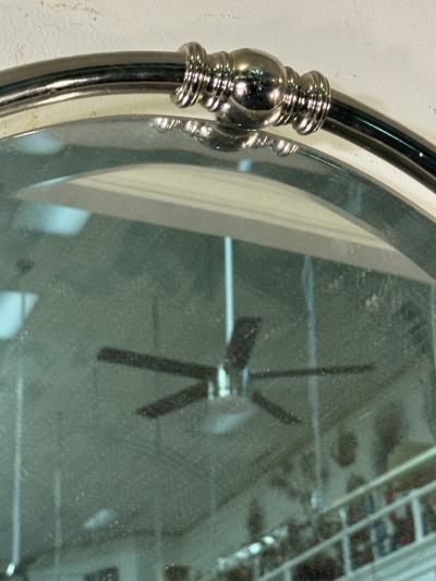 MODERN PAIR OF FLOATING OVAL CHROME FRAMED MIRRORS