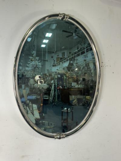 MODERN PAIR OF FLOATING OVAL CHROME FRAMED MIRRORS