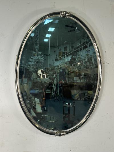 MODERN PAIR OF FLOATING OVAL CHROME FRAMED MIRRORS