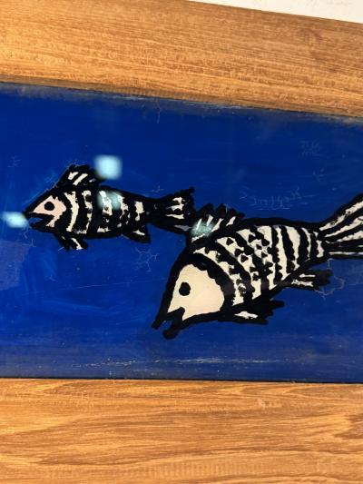 MODERN PAIR OF REVERSE PAINTINGS ON GLASS MAN FISHING