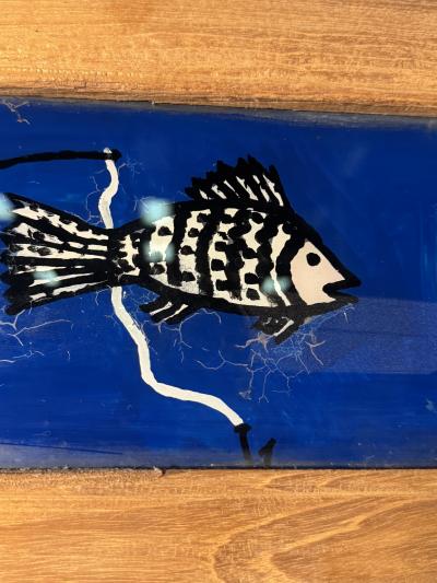 MODERN PAIR OF REVERSE PAINTINGS ON GLASS MAN FISHING