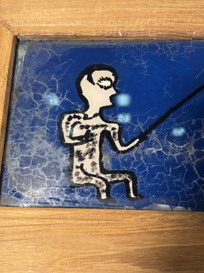 MODERN PAIR OF REVERSE PAINTINGS ON GLASS MAN FISHING