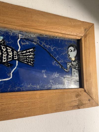 MODERN PAIR OF REVERSE PAINTINGS ON GLASS MAN FISHING