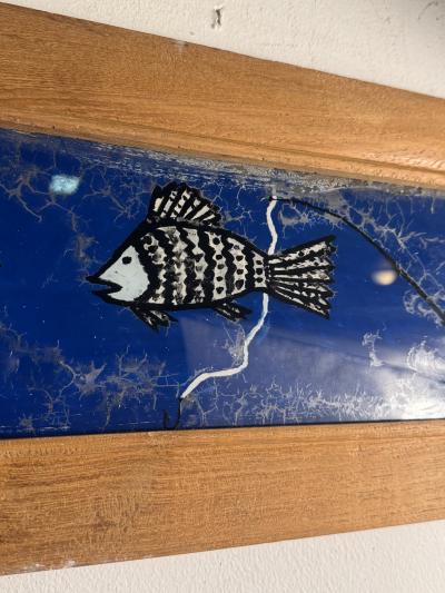 MODERN PAIR OF REVERSE PAINTINGS ON GLASS MAN FISHING