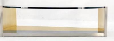 MODERNIST BRASS AND CHROME OVAL COFFEE TABLE IN THE MANNER OF MARIA PERGAY