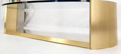 MODERNIST BRASS AND CHROME OVAL COFFEE TABLE IN THE MANNER OF MARIA PERGAY