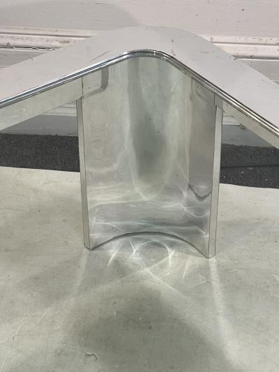 MODERNIST CHROME AND GLASS TRIANGULAR COFFEE TABLE