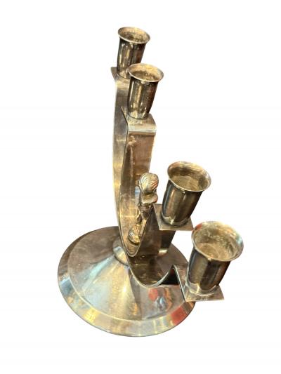 MODERNIST PAIR OF ART DECO SILVERED CANDELABRA WITH STYLIZED CHERUB IN RING