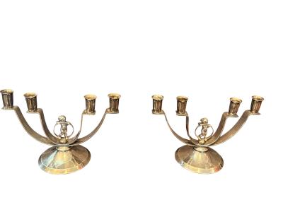 MODERNIST PAIR OF ART DECO SILVERED CANDELABRA WITH STYLIZED CHERUB IN RING