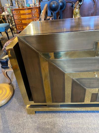 MODERNIST POLISHED AND PATINATED BRASS CREDENZA