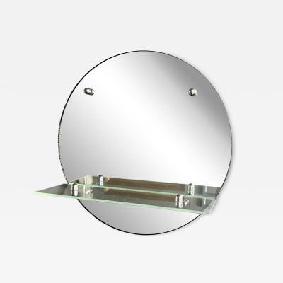 MODERNIST ROUND ART DECO MIRROR WITH CHROME ACCENTS AND GLASS SHELF