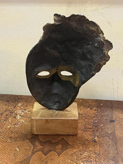 MODERNIST SUITE OF THREE BRUTALIST BRONZE MASK SCULPTURES