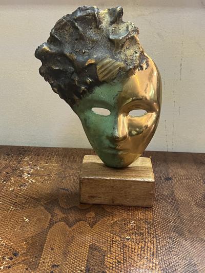 MODERNIST SUITE OF THREE BRUTALIST BRONZE MASK SCULPTURES