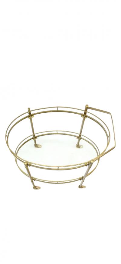 MODERNIST TWO TIER OVAL BRASS GLASS BAR CART