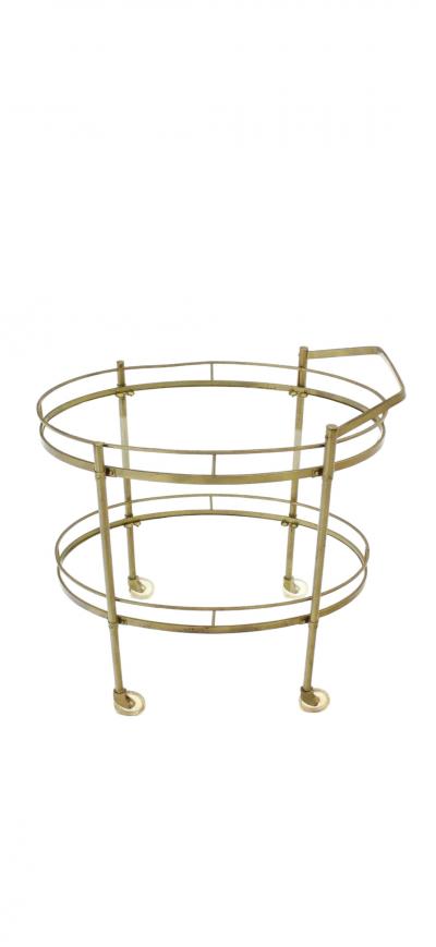 MODERNIST TWO TIER OVAL BRASS GLASS BAR CART