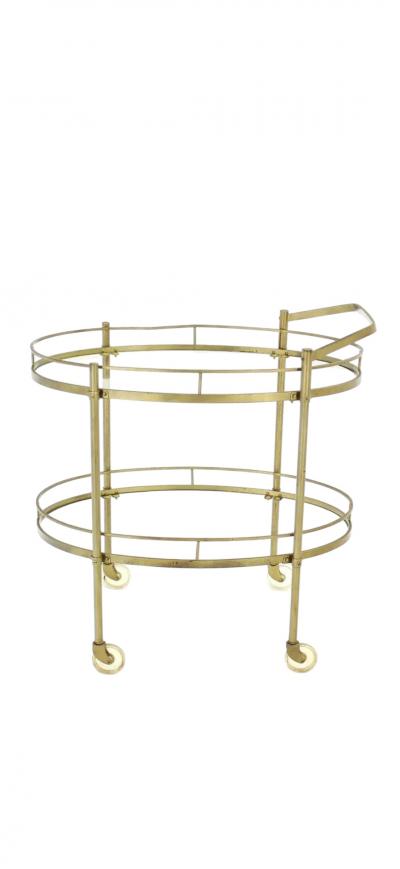 MODERNIST TWO TIER OVAL BRASS GLASS BAR CART