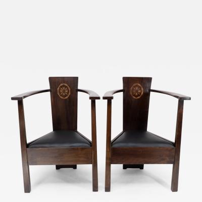 Mackay Hugh Baillie Scott A pair of stained beech and inlaid armchairs