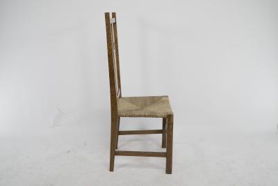 Mackay Hugh Baillie Scott M H Baillie Scott attributed An Arts Crafts oak chair with pierced decoration