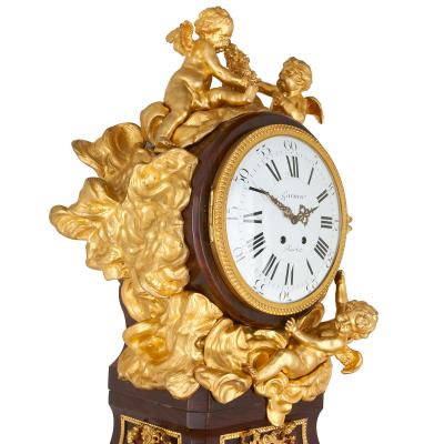 Mahogany and gilt bronze Rococo pedestal clock after Riesener