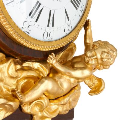 Mahogany and gilt bronze Rococo pedestal clock after Riesener
