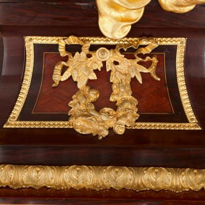 Mahogany and gilt bronze Rococo pedestal clock after Riesener