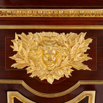 Mahogany and gilt bronze Rococo pedestal clock after Riesener