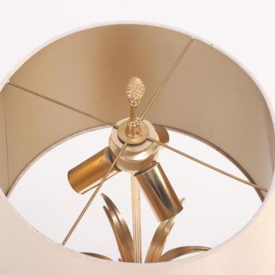 Maison Charles French brass and polished steel table lamp attributed to Maison Charles C 1950 