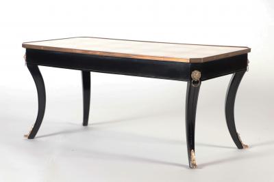 Maison Jansen A French Louis XV style ebonized and gold coffee table in the manner of Jansen