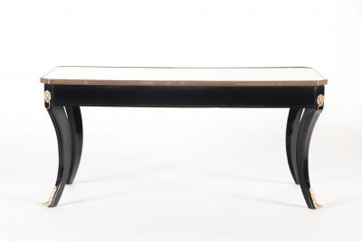 Maison Jansen A French Louis XV style ebonized and gold coffee table in the manner of Jansen