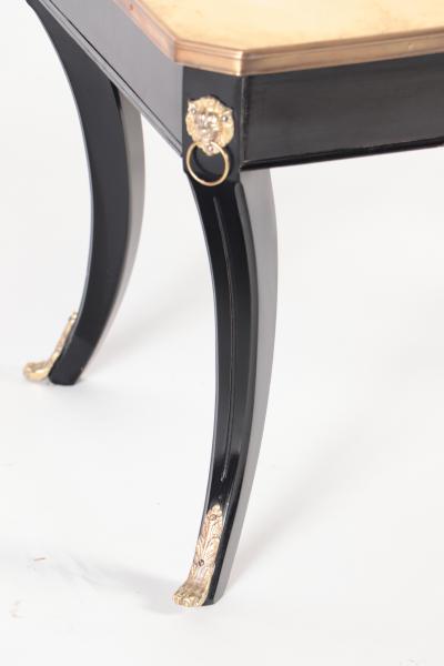 Maison Jansen A French Louis XV style ebonized and gold coffee table in the manner of Jansen
