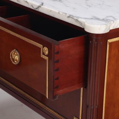Maison Jansen A Pair of Louis XVI style marble top mahogany commodes signed Jansen C 1940