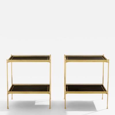 Maison Jansen Maison Jansen pair of two tier side tables brass black leather 1960s