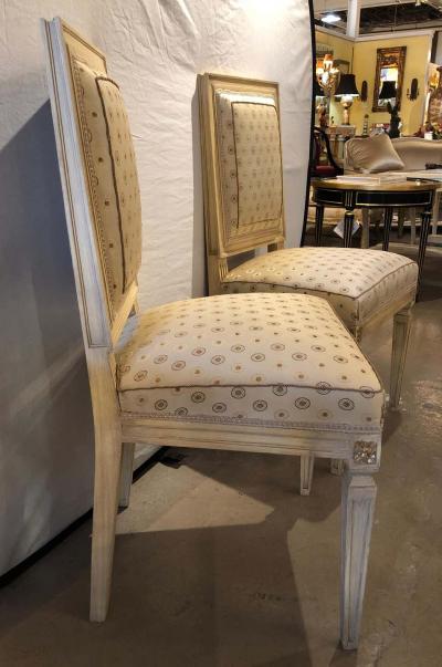 Maison Jansen Set of Ten Jansen Style Paint Decorated Gilt Louis XVI Style Dining Chairs