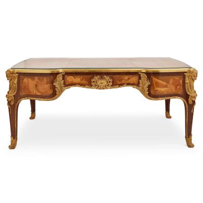 Maison L ger Antique French Louis XV style ormolu mounted marquetry desk by Maison L ger