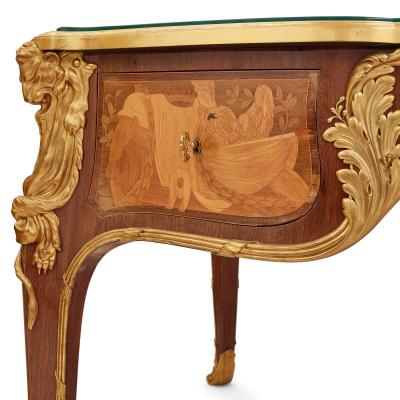 Maison L ger Antique French Louis XV style ormolu mounted marquetry desk by Maison L ger