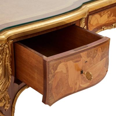Maison L ger Antique French Louis XV style ormolu mounted marquetry desk by Maison L ger