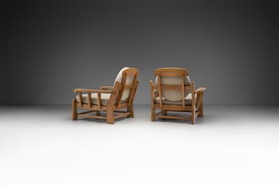 Maison Regain Pair of French Elm Wood Lounge Chairs by Maison Regain France 1970s